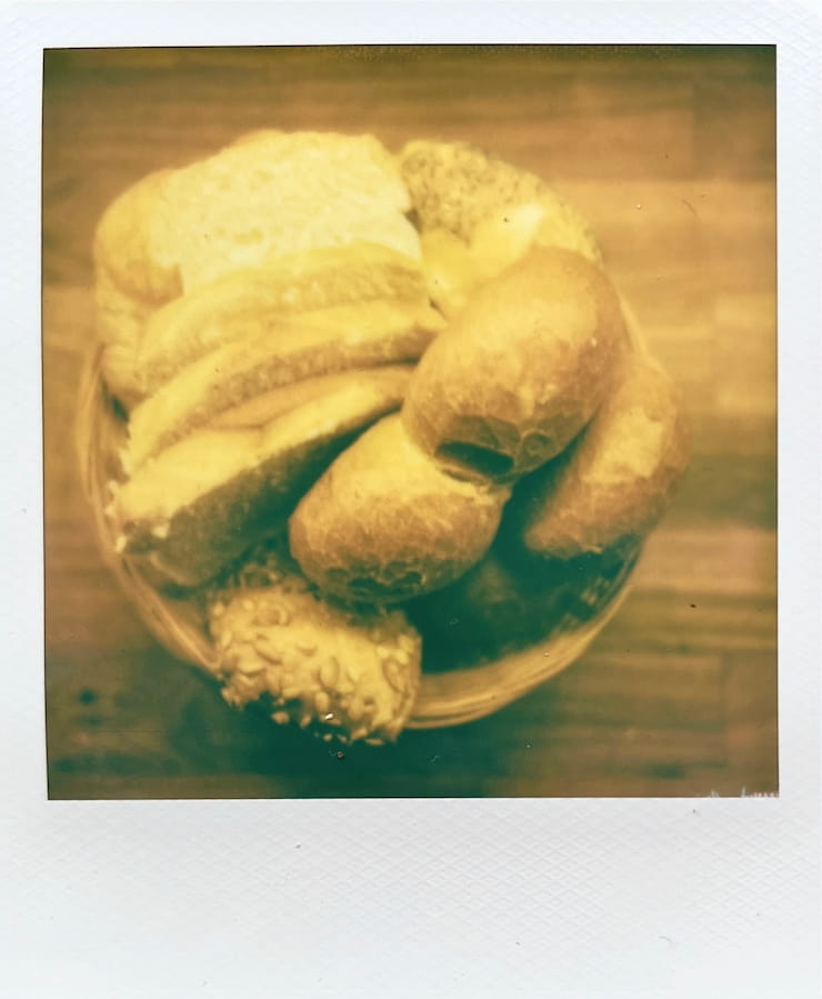 A basket of bread rolls and 