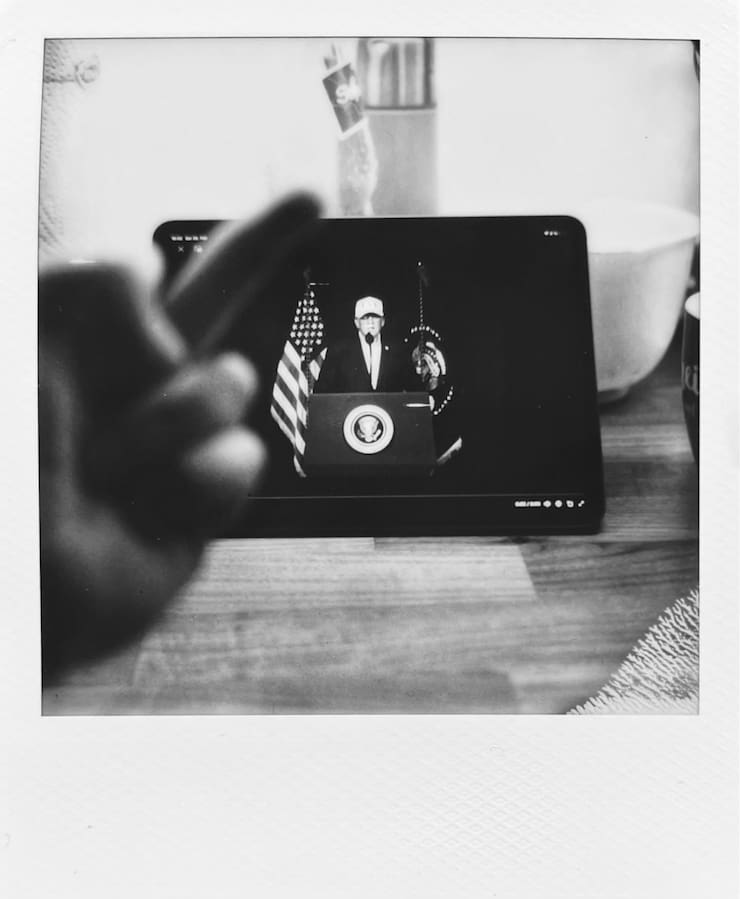 An iPad on a kitchen counter showing a video of president
      Trump's speach anouncing the war on Iran.
