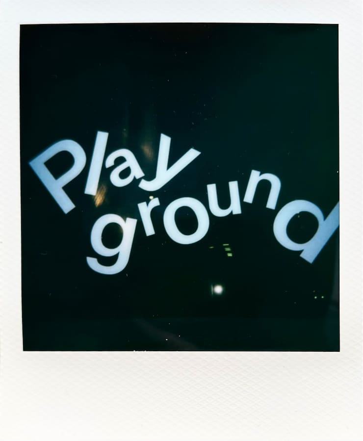 Playful arranged large letters spelling
      