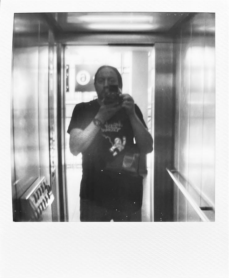Me in the mirror of an elevator.