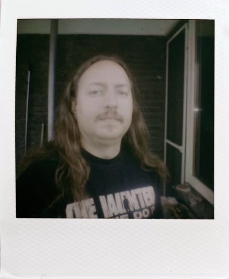 Me. With a moustache.